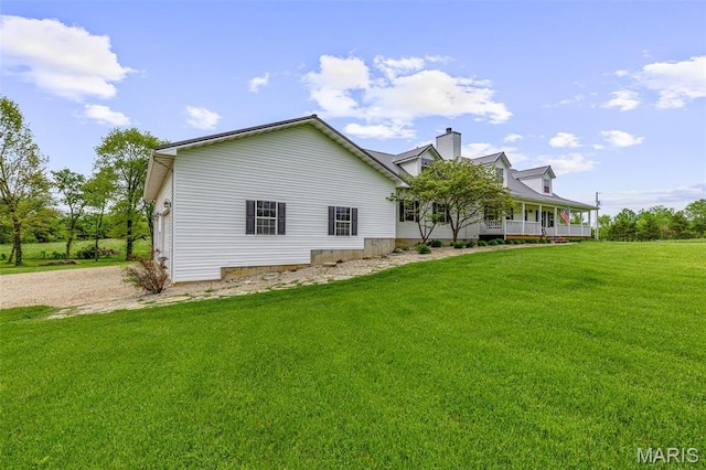 802 Hager Rd, Farmington, MO 63640 - view of front of house featuring a front yard, a porch, and a chimney