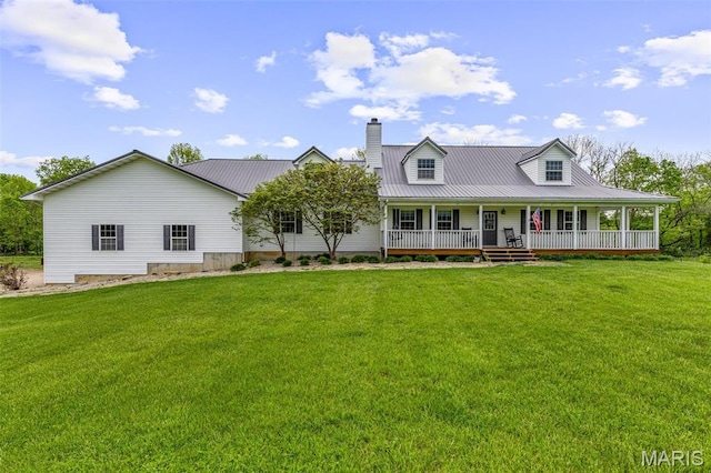 802 Hager Rd, Farmington, MO 63640 - view of front of property featuring a porch, metal roof, a front lawn, and a chimney