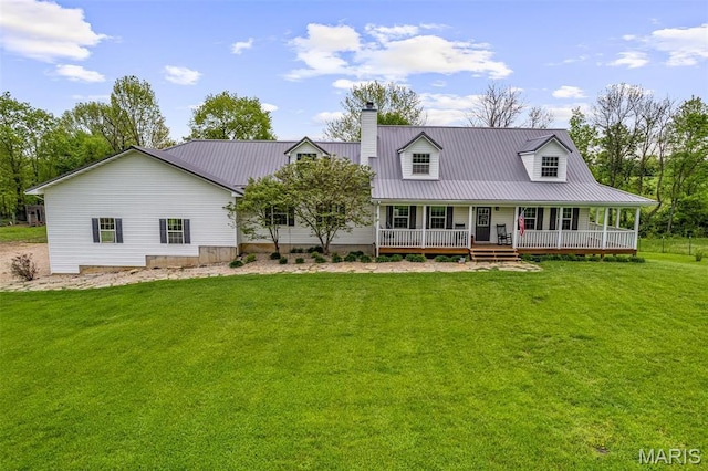 802 Hager Rd, Farmington, MO 63640 - view of front of property featuring covered porch, a chimney, a front yard, and metal roof