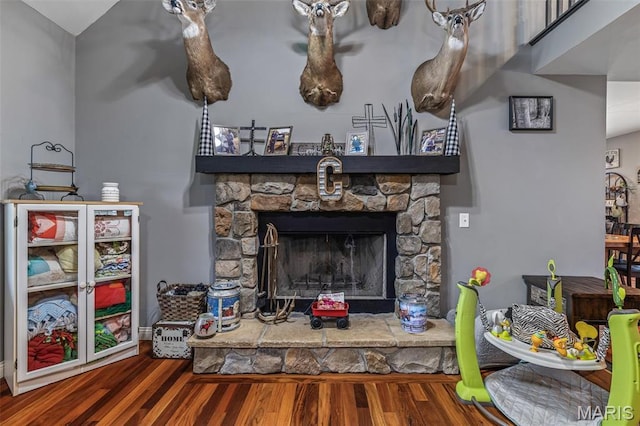 802 Hager Rd, Farmington, MO 63640 - living room with wood finished floors and a fireplace