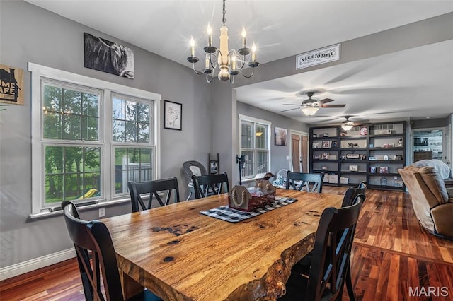 802 Hager Rd, Farmington, MO 63640 - dining room with wood finished floors, a chandelier, baseboards, and ceiling fan
