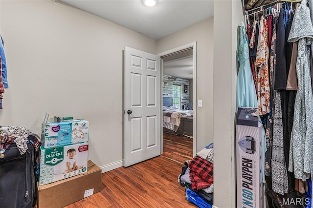 802 Hager Rd, Farmington, MO 63640 - walk in closet with wood finished floors