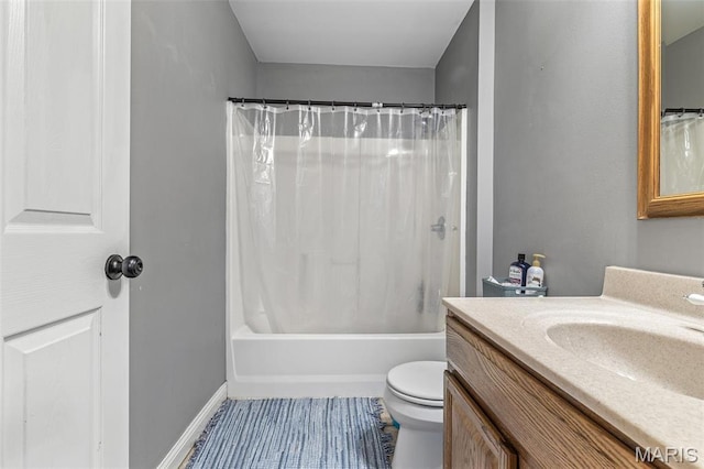 802 Hager Rd, Farmington, MO 63640 - full bathroom with vanity, toilet, shower / tub combo, and baseboards