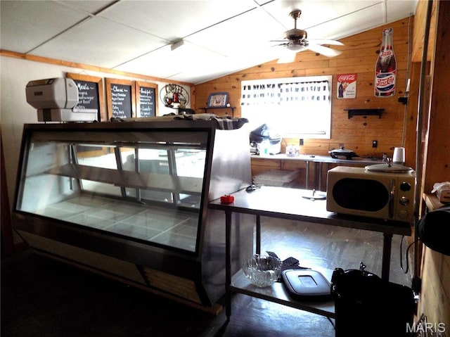 491 Broadway St, Edgar Springs, MO 65462 - office space featuring wooden walls, a ceiling fan, and lofted ceiling