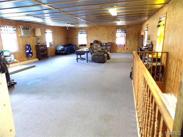 491 Broadway St, Edgar Springs, MO 65462 - living area featuring a wall mounted air conditioner, wooden walls, and carpet