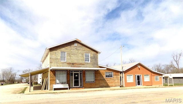 491 Broadway St, Edgar Springs, MO 65462 - rear view of house featuring an attached carport
