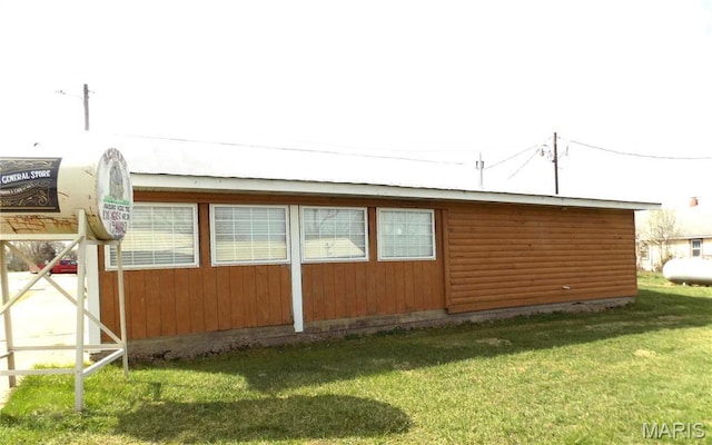 491 Broadway St, Edgar Springs, MO 65462 - view of home's exterior featuring a lawn