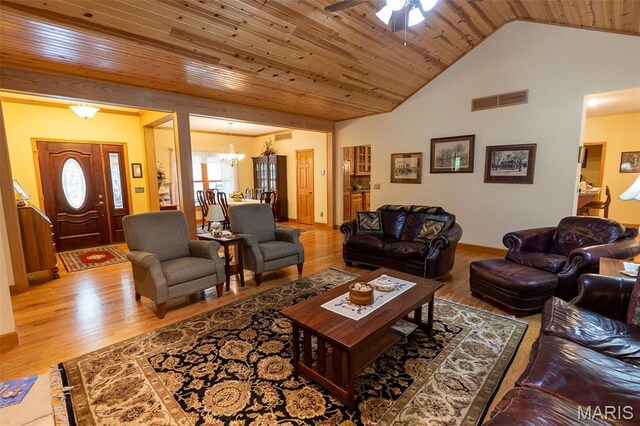 14035 County Road 4110, Rolla, MO 65401 - living room with light wood-style flooring, a chandelier, ceiling fan, wooden ceiling, and lofted ceiling