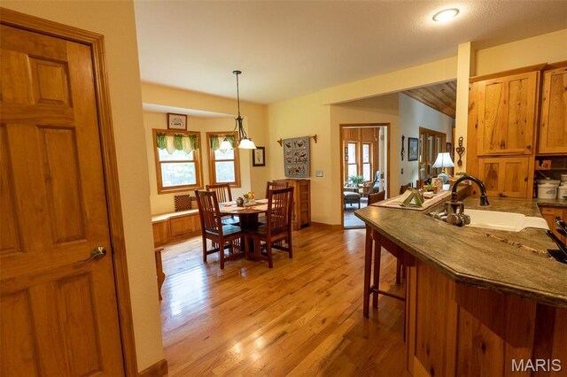 14035 County Road 4110, Rolla, MO 65401 - dining space with plenty of natural light and light wood-style floors