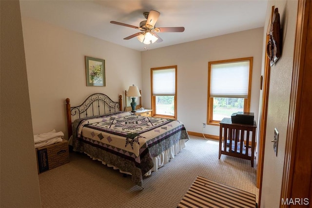 14035 County Road 4110, Rolla, MO 65401 - bedroom featuring carpet flooring, a ceiling fan, and baseboards