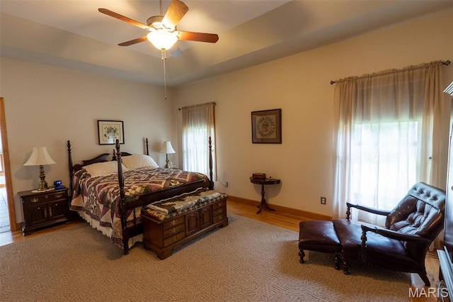 14035 County Road 4110, Rolla, MO 65401 - bedroom featuring light wood-type flooring, baseboards, and ceiling fan