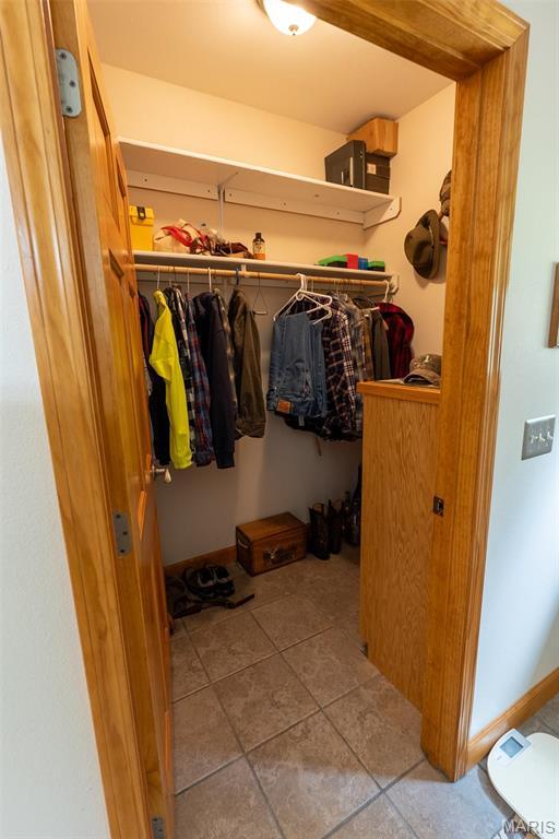 14035 County Road 4110, Rolla, MO 65401 - spacious closet with tile patterned floors