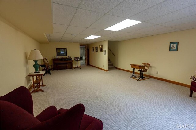 14035 County Road 4110, Rolla, MO 65401 - carpeted living room featuring stairway, a drop ceiling, and baseboards