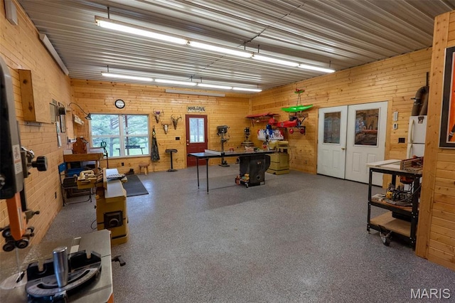 14035 County Road 4110, Rolla, MO 65401 - recreation room with wooden walls and a workshop area