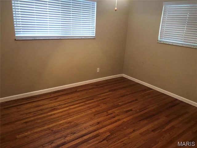 4501 San Francisco, San Francisco, Saint Louis, MO 63115 - empty room with baseboards and dark wood-style floors