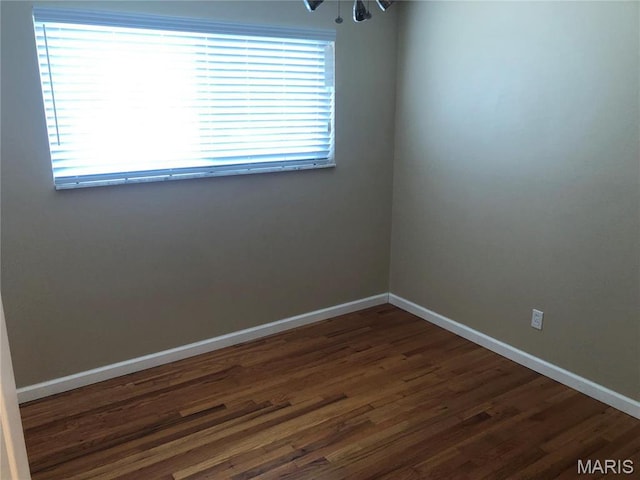 4501 San Francisco, San Francisco, Saint Louis, MO 63115 - empty room with dark wood-style floors and baseboards