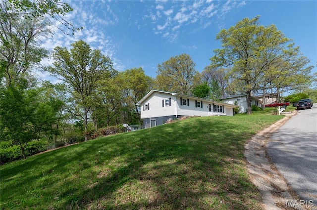 21695 Sable Rd, Waynesville, MO 65583 - view of front of house featuring a front yard