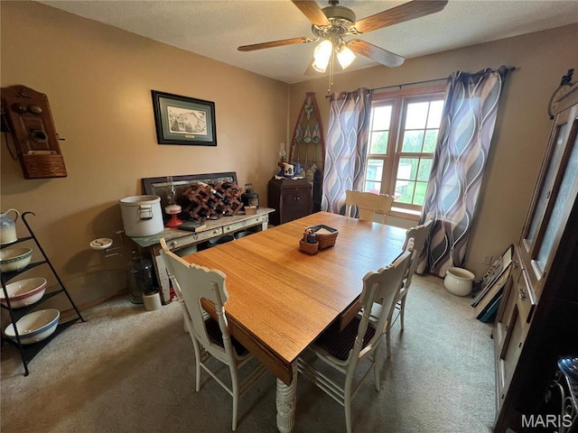 7070 Goldenrod Rd, Hannibal, MO 63401 - dining room with carpet floors and a ceiling fan