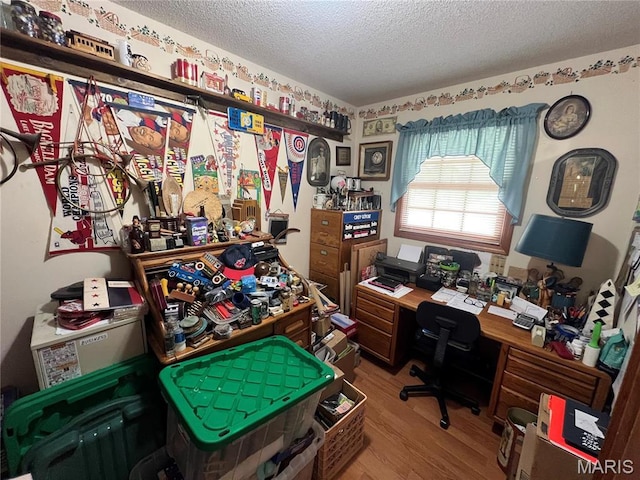 7070 Goldenrod Rd, Hannibal, MO 63401 - office featuring a textured ceiling and wood finished floors