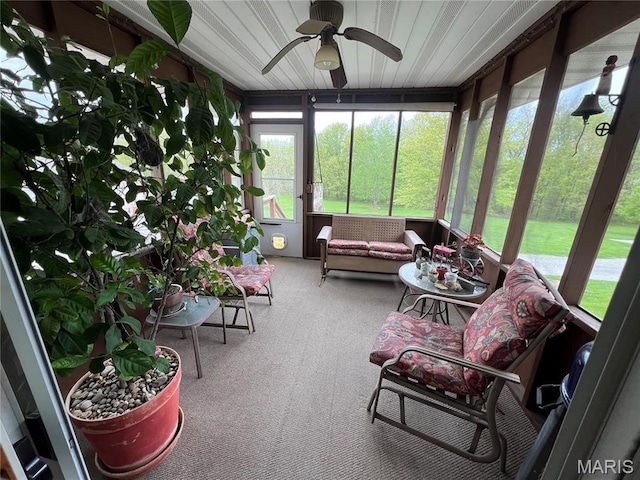 7070 Goldenrod Rd, Hannibal, MO 63401 - sunroom featuring ceiling fan, plenty of natural light, and an outdoor hangout area