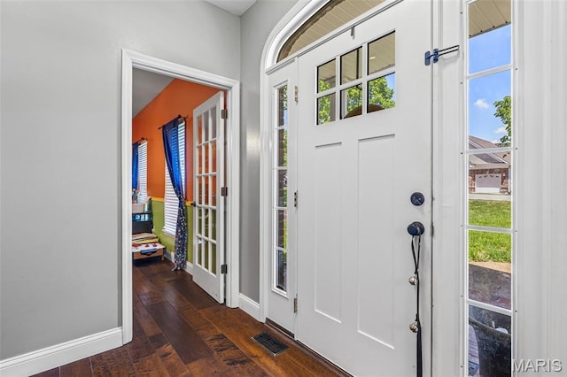 162 Saint Benedict, Pevely, MO 63070 - entrance foyer featuring baseboards, hardwood / wood-style floors, and healthy amount of natural light