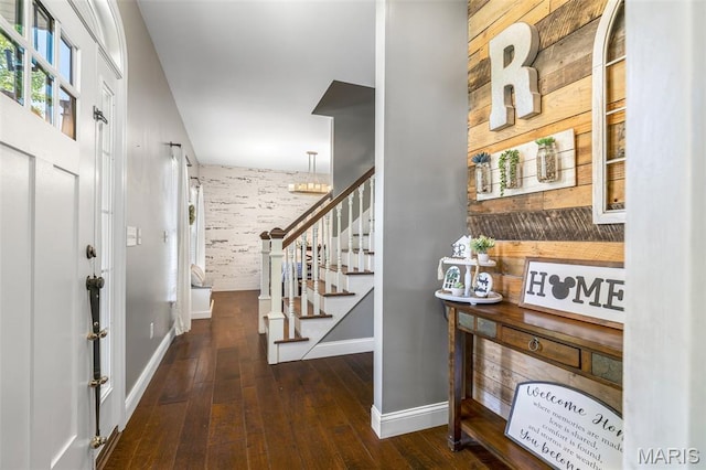 162 Saint Benedict, Pevely, MO 63070 - entryway featuring wood-type flooring, baseboards, stairs, and a chandelier