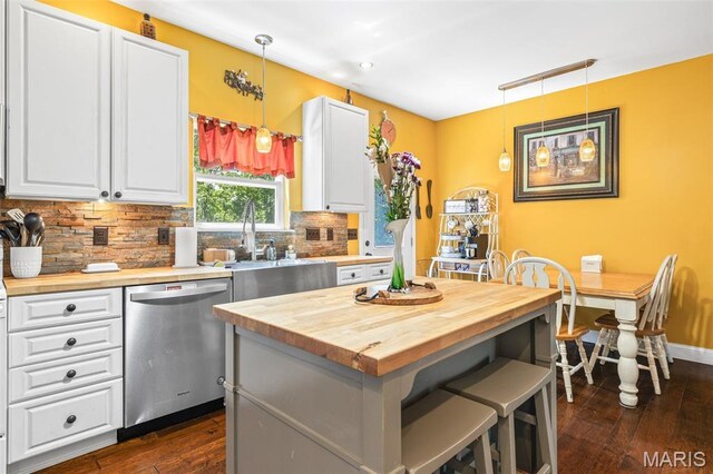 162 Saint Benedict, Pevely, MO 63070 - kitchen with dishwasher, butcher block countertops, backsplash, dark wood-style floors, and white cabinets