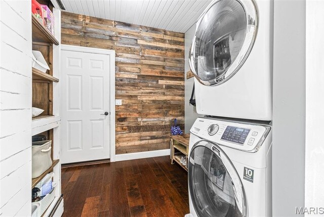 162 Saint Benedict, Pevely, MO 63070 - laundry area with wood walls, stacked washing machine and dryer, dark wood finished floors, baseboards, and wooden ceiling
