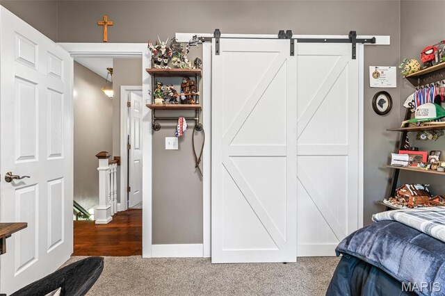 162 Saint Benedict, Pevely, MO 63070 - bedroom with carpet floors and a barn door