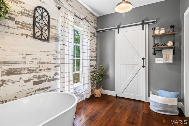162 Saint Benedict, Pevely, MO 63070 - full bath with a freestanding tub, wood-type flooring, and baseboards