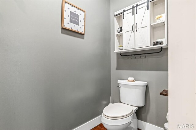 162 Saint Benedict, Pevely, MO 63070 - half bathroom with toilet and baseboards