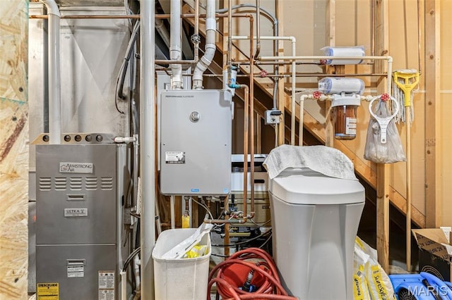 162 Saint Benedict, Pevely, MO 63070 - utility room with water heater and heating unit