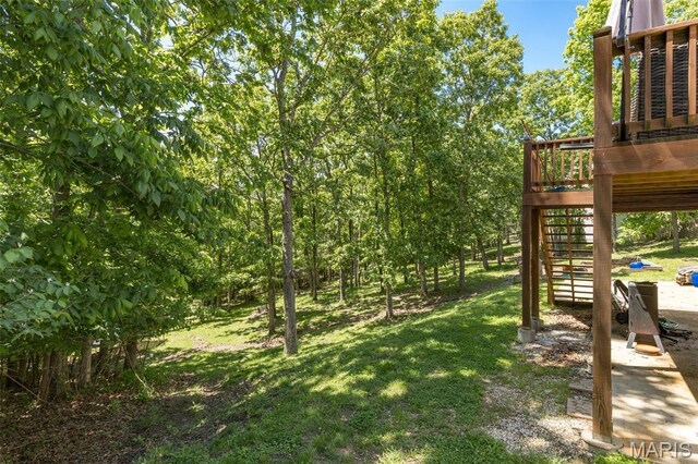 162 Saint Benedict, Pevely, MO 63070 - view of green lawn with stairway and a deck