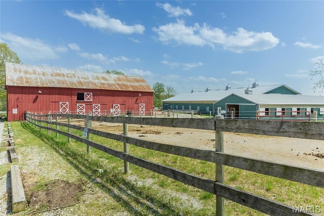 2635 Grendel Rdg, Innsbrook, MO 63390 - view of yard featuring an outdoor structure, a barn, and fence