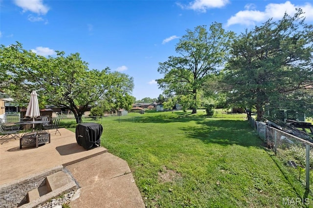 8452 S Laclede Station Rd, Saint Louis, MO 63123 - view of yard featuring a patio area and an outdoor fire pit