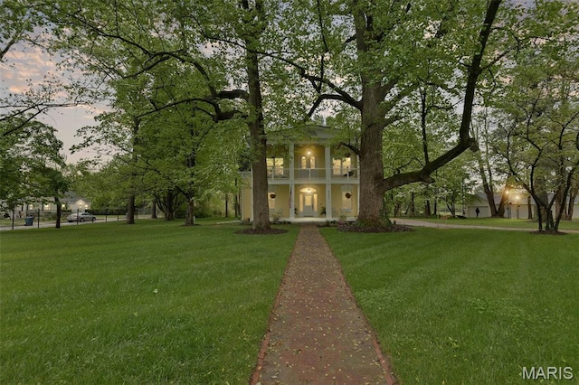 2367 Central Ave, Alton, IL 62002 - neoclassical home featuring a balcony and a lawn