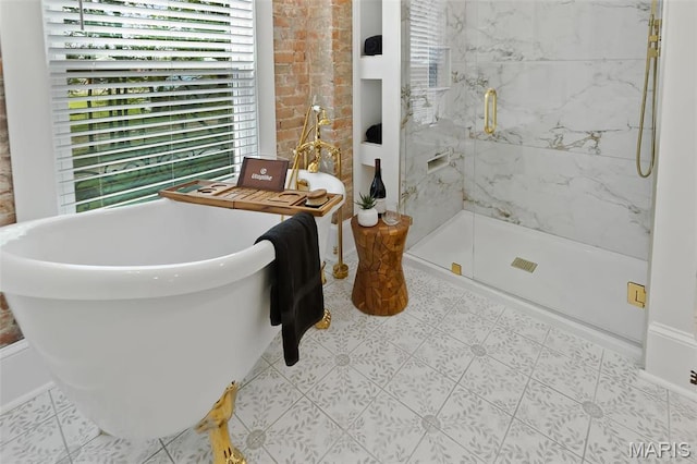 2367 Central Ave, Alton, IL 62002 - full bath featuring healthy amount of natural light, a marble finish shower, and a freestanding tub