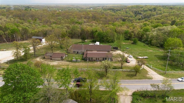 10366 County Road 3060, Rolla, MO 65401 - aerial view of property and surrounding area featuring a heavily wooded area