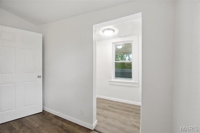 202 N Thomas St, De Soto, MO 63020 - empty room featuring wood finished floors and baseboards