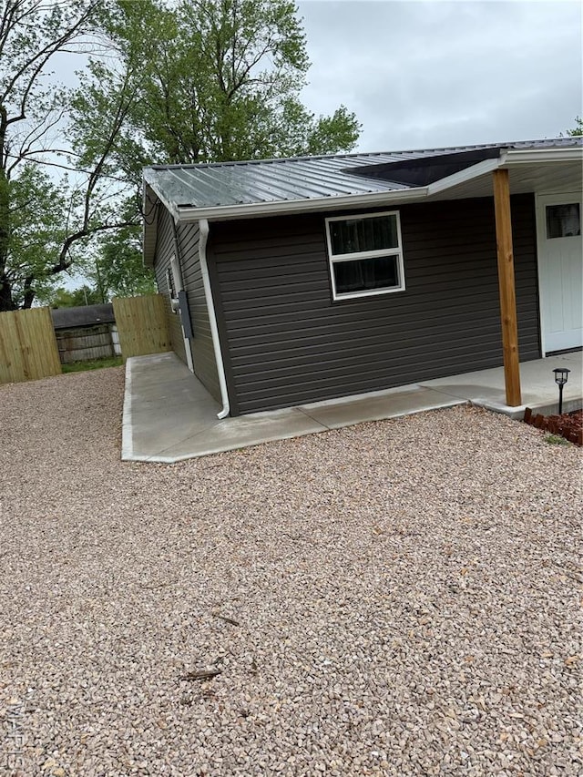 229 Siebenman St, Bourbon, MO 65441 - view of side of home with a patio