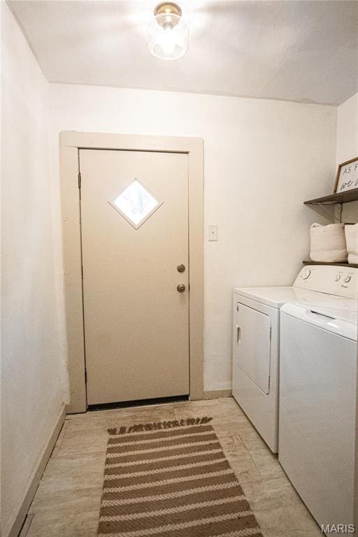 504 Henrietta St, Gillespie, IL 62033 - laundry room with separate washer and dryer and baseboards