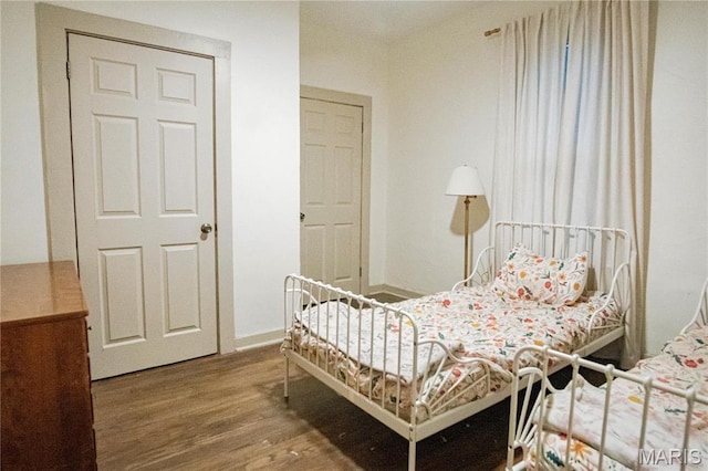 504 Henrietta St, Gillespie, IL 62033 - bedroom featuring wood finished floors and baseboards