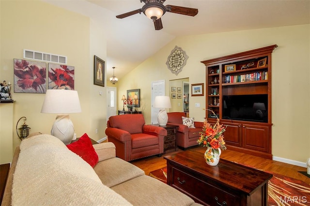 9574 Woodcrest Pl, Breese, IL 62230 - living area featuring ceiling fan, wood finished floors, lofted ceiling, and baseboards