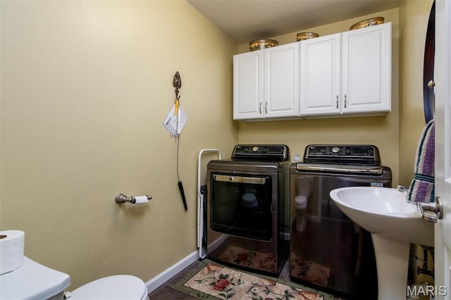 9574 Woodcrest Pl, Breese, IL 62230 - laundry room featuring independent washer and dryer and baseboards