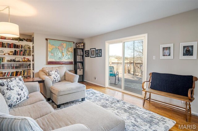 729 W State St, Union, MO 63084 - living area featuring wood finished floors and baseboards