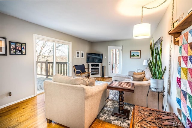 729 W State St, Union, MO 63084 - living area featuring light wood-type flooring and baseboards