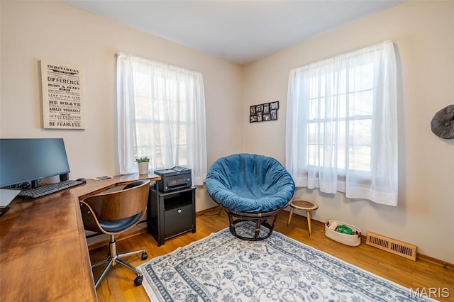 729 W State St, Union, MO 63084 - home office featuring healthy amount of natural light and light wood-style floors