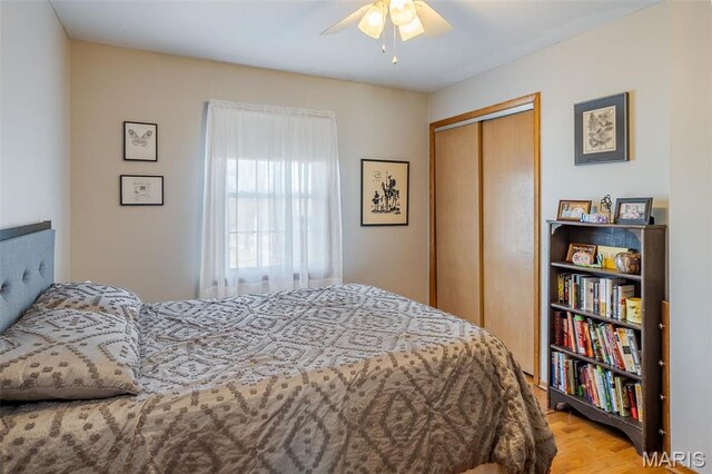 729 W State St, Union, MO 63084 - bedroom featuring wood finished floors, a closet, and a ceiling fan