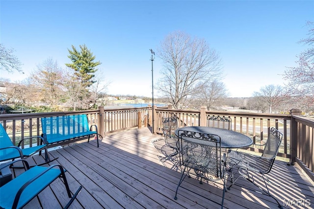 729 W State St, Union, MO 63084 - wooden terrace with a water view and outdoor dining area