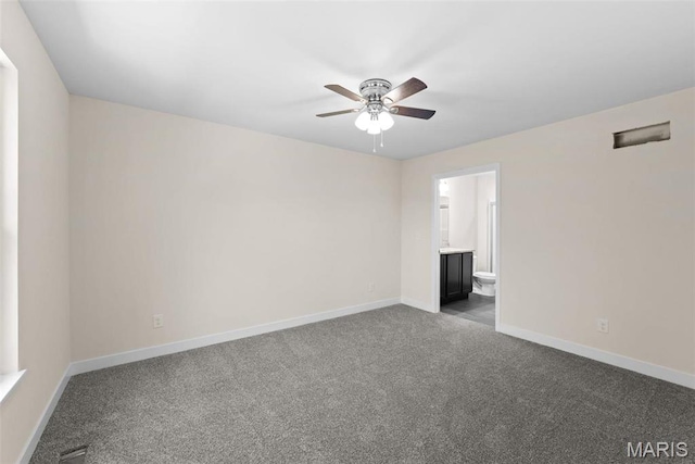 282 Railroad St, Moscow Mills, MO 63362 - carpeted empty room with a ceiling fan and baseboards